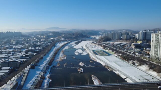 Beautiful snow-covered Seocheon-gyo Bridge and river landscape, Yeongju, South Korea