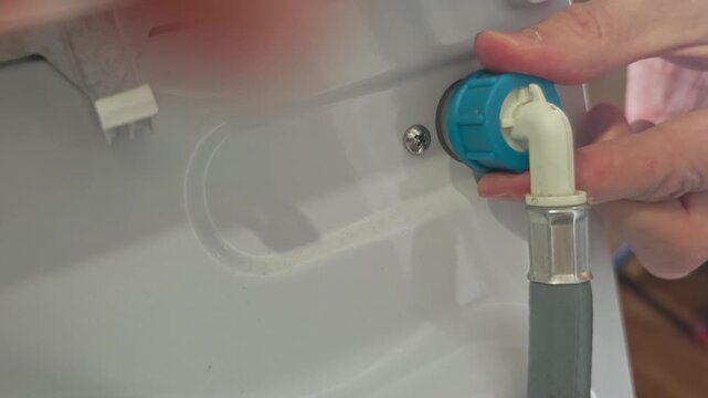 Learn how to attach a water hose to a washing machine in a simple way.