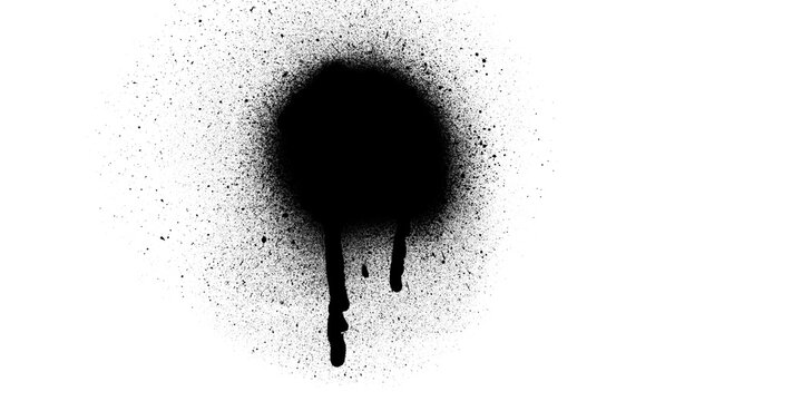 A single dark circular spot of black spray paint featuring artistic drips running down the center