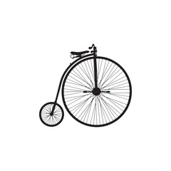 Fototapeta premium Black and white vintage style bicycle with large front wheel bike old-fashioned penny-farthing