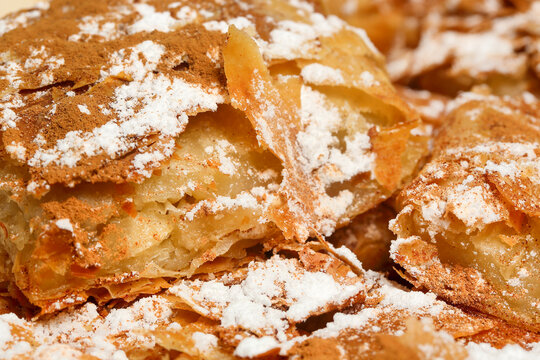 bougatsa greek puff pastry With cinnamon and icing sugar