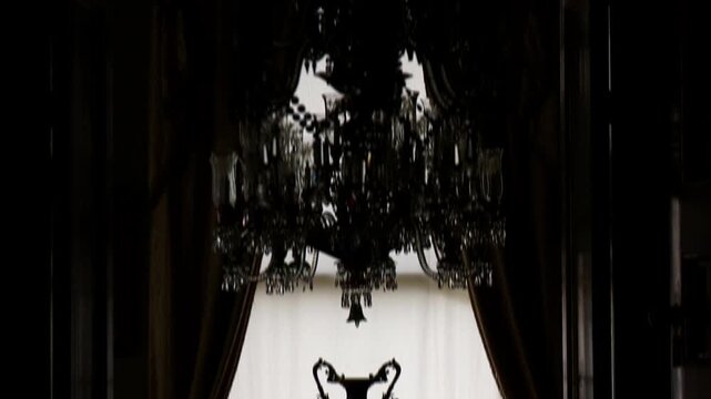 camera tilt on old vase against window