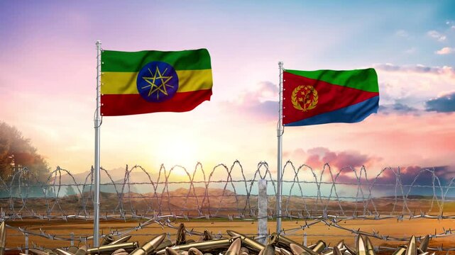 Ethiopian and Eritrean flags waving above a barbed wire fence motion footage