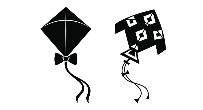 Two black kites with distinctive designs shown in dark silhouette