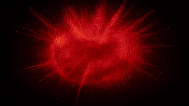 Abstract image of a brilliant red starburst against a black backdrop
