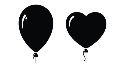 Two black balloons one round and one heart shaped in silhouette © Jesmin