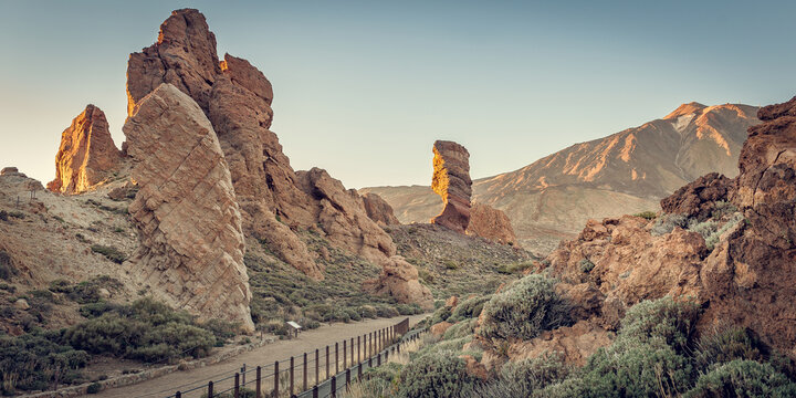 Teide National Park Volcanic Landscape, Roques de Garcia Formations, Roque Cinchado, Rugged Mountain Scenery, Warm Sunset Light, Tenerife Spain Geology Panorama