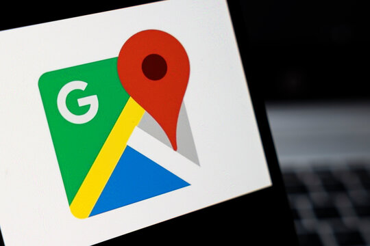Warsaw, Poland - April 2, 2026: A close-up view of the Google Maps logo featuring green, blue, yellow, and red colors. The logo represents navigation and location services technology.