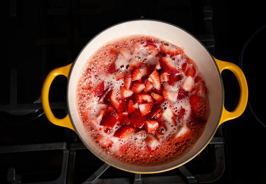 Strawberries cooking in a pot 