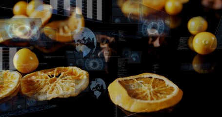 Obraz premium Showing two dried citrus slices resting on glossy black top, with yellow fruits and HUD overlays