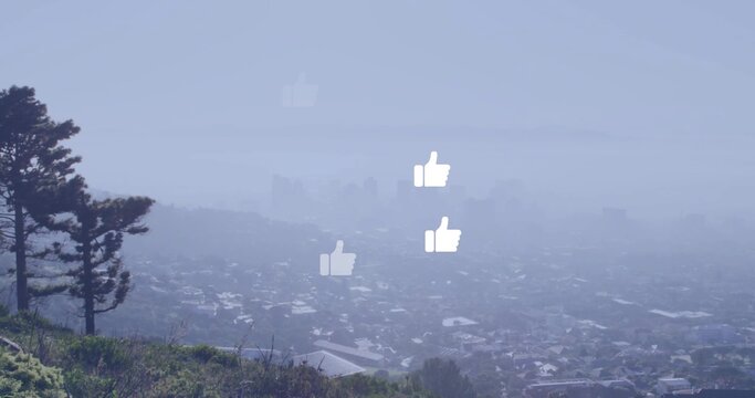 Floating white thumbs-up icons hovering over foggy neighborhood from hill, showing pine tree
