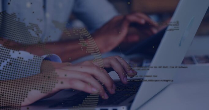 Typing hands pressing laptop keyboards at office desk, showing cuff and world map overlay with code