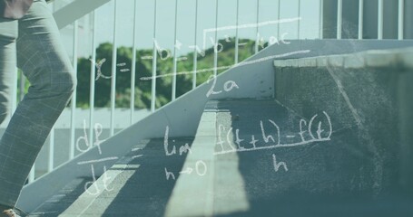 Obraz premium Walking man in plaid pants, shoes stepping on stairs with railings and chalk math, copy space