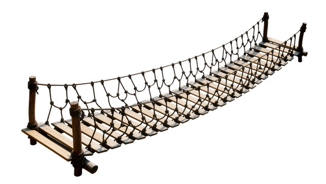 Isolated rope bridge made of wood planks and braided ropes for adventure playground