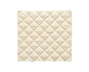 Fototapeta premium Cream quilted fabric swatch with diamond pattern