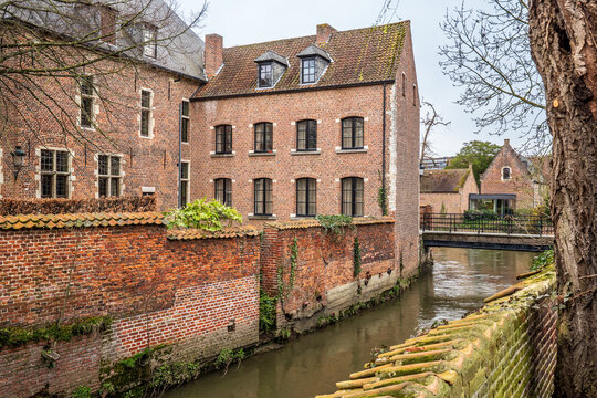 Historic buildings and Dyle River in the Grand Beguinage of Leuven, Belgium