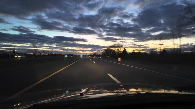 Night Driving on Highway in USA With Construction Pylons Nearby
