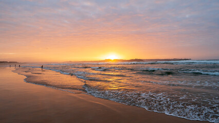 Obraz premium Beautiful sunset at Loredo´s Beach, Cantabria, Spain