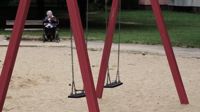 empty swing in the playground 4K