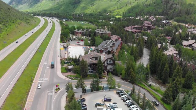 Vail city center and surrounding mountains, Colorado. Aerial view from drone in summer season