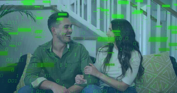 Couple sitting on couch sharing chat man holding card starting technology binary bars hiding faces