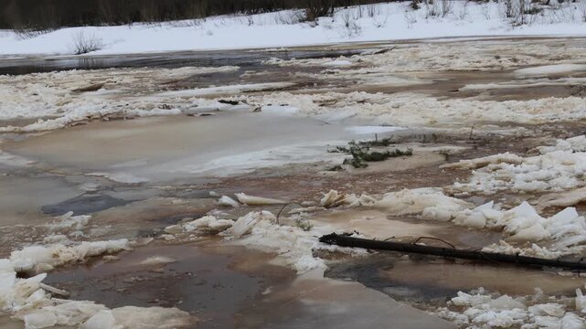 the beginning of ice drift on the Vyatka River in the forests of northeastern Europe in early April
