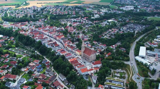 Aerial panorama view of the city Neuoetting in Germany on a cloudy day in late Spring