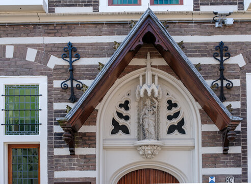 Detail of the historical facade of the old townhall of the city of Alkmaar with Lady Justice  - Vrouwe Justitia stadhuis Alkmaar