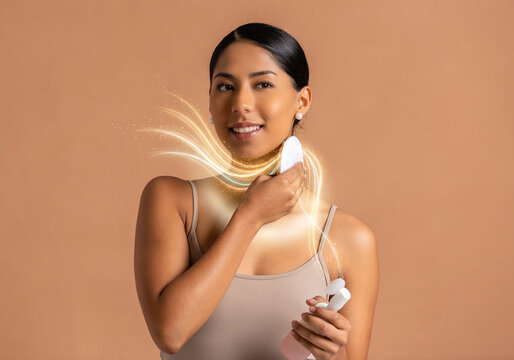 Woman cleansing neck with cotton pad and skincare product