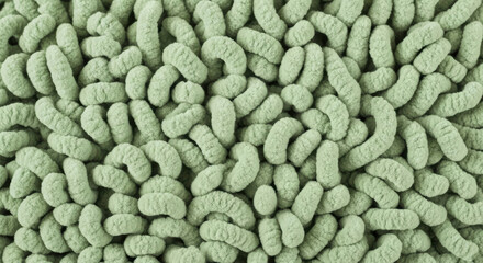 Naklejka premium Close-up of soft green textured pillows on a surface