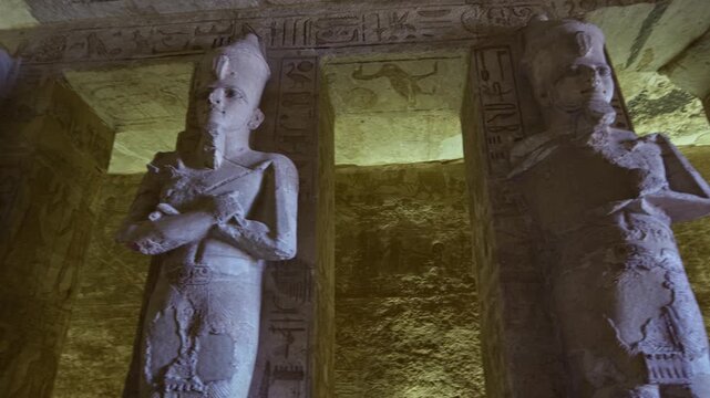 Colossal Ramesses II statues, Abu Simbel temple interior. Egypt.