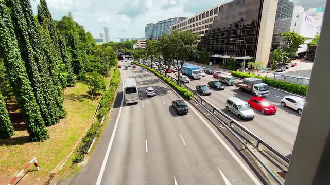 SINGAPORE - JANUARY 3, 2019: City traffic on a sunny day from an overpass