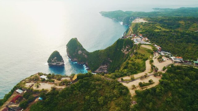 Aerial drone flying above Kelingking beach in Nusa Penida Bali