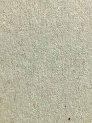 Fototapeta premium Primer plano de textura de papel reciclado granulado en color crema