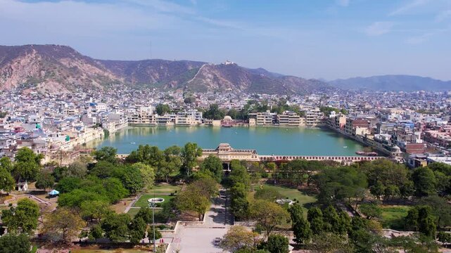 Tal Katora Lake in Jaipur with surrounding cityscape, water body, and urban landscape in Rajasthan, India.