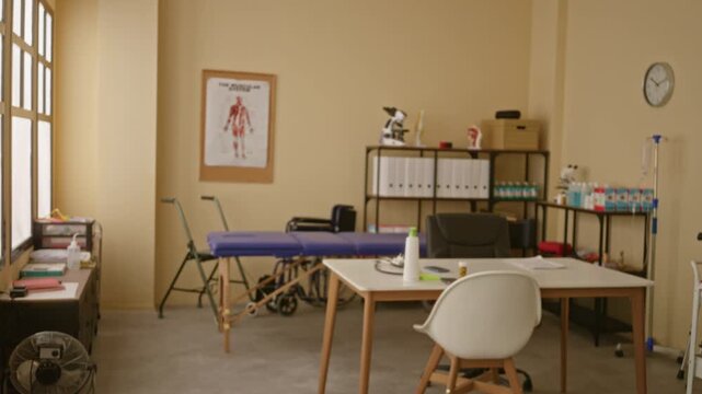 Physical therapy clinic interior with soft blurred bokeh background and shallow focus; background backdrop copyspace calm.