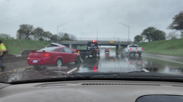 Rainy Day Driving Past Vehicle Accident With Police in USA
