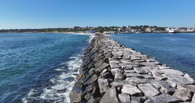 New Shoreham, RI, USA - August 8, 2026  Block Island, Rhode Island summer arial video of the breakwater barrier at Old Harbor.