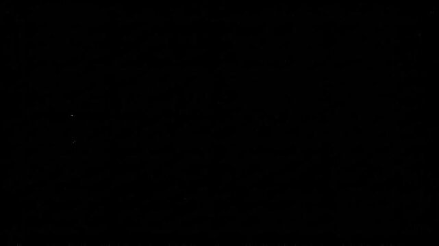 Glowing golden hearts floating against dark background