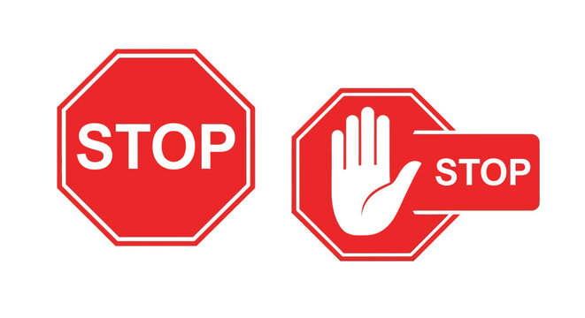 Two red stop signs one with a hand a striking silhouette