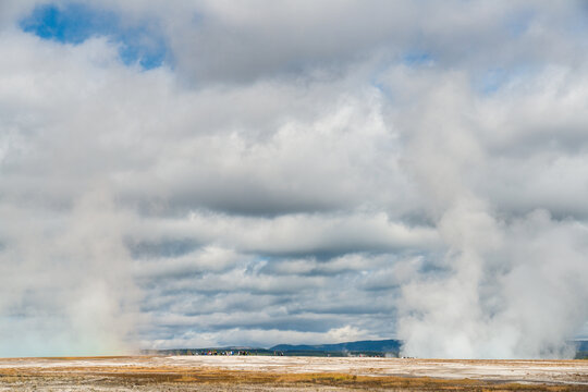 USA, Wyoming, Yellowstone National Park.  Geysers venting into the sky in the Midway Geyser Basin
