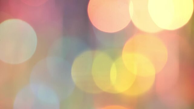 Colorful bokeh circles creating abstract light background for celebration and design