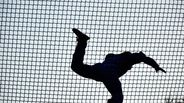 Person experiencing bodyflight in an indoor wind tunnel, practicing extreme sport