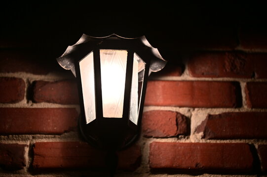 Lamp on a Brick Wall