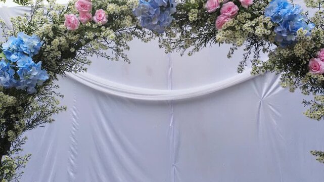 Beautiful Wedding Floral Arrangement Featuring Blue Hydrangeas, Pink Roses, and White Aster Flowers for Romantic Event Decor