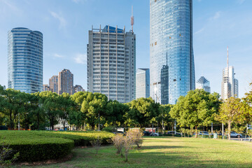 Fototapeta premium city park with modern building background in shanghai