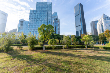 Obraz premium city park with modern building background in shanghai