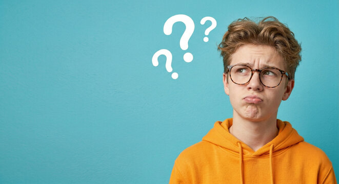 Young man with questioning expression.