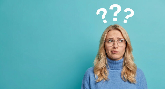 Woman with puzzled expression and questions.
