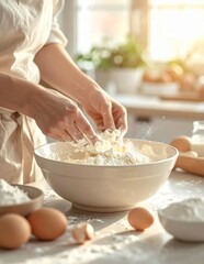Fototapeta premium Womans Hands Mixing Flour in a Bowl for Baking.